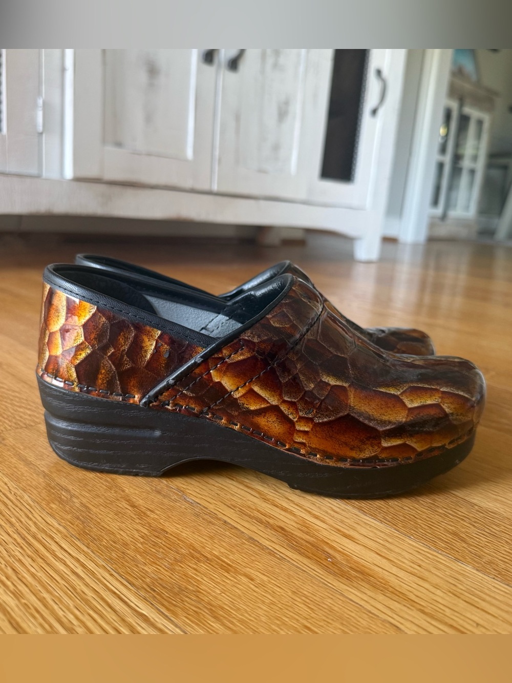 Dansko Tigers Eye Brown Patent leather clogs